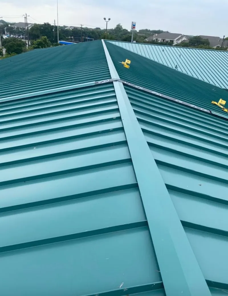 Green commercial metal roof ridge and valley for Metal Roof Repair in Avra Valley